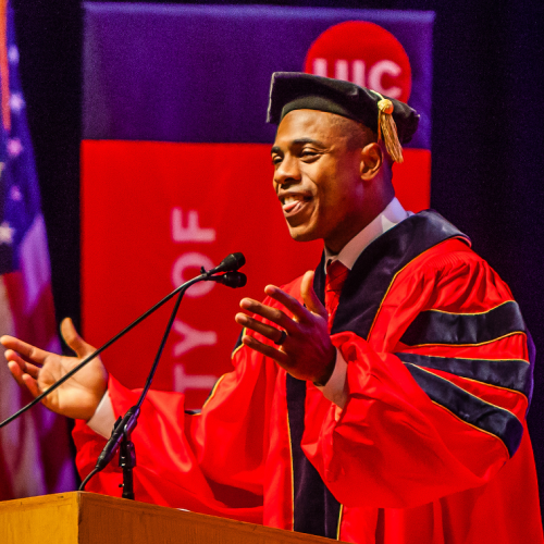 black alumni giving commencement speech